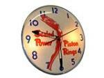 1950s Sealed Power Piston Rings light-up service station clock with beautiful goddess of speed logo. - Front 3/4 - 113173