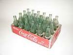 1950s wooden case of coca-cola embossed glass bottles from various plants. - Front 3/4 - 113296