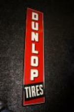 Addendum Item - Very clean Late 1950s Dunlop Tires self framed vertical tin sign. - Front 3/4 - 145293