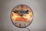 Scarce 1950s Go Greyhound "And Leave the Driving to Us" glass faced light-up bus depot clock. - Front 3/4 - 151627