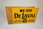 Desirable N.O.S. 1940s De Lavel Milkers single-sided tin sign found in the original shipping sleeve. - Front 3/4 - 151663