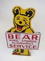 Fun 1950s Bear Wheel-Steering Alinement double-sided die-cut tin garage sign. - Front 3/4 - 202798