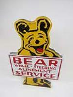 Fun 1950s Bear Wheel-Steering Alinement double-sided die-cut tin garage sign. - Rear 3/4 - 202798