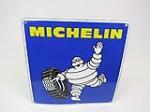 1950s Michelin Tires single-sided porcelain automotive garage sign with Bibendum (Michelin Man) graphic. - Front 3/4 - 203003