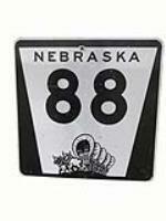 Vintage Nebraska 88 metal highway road sign with Pioneer covered wagon logo. - Front 3/4 - 211691