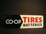 Very clean early 60s Co-op Tires single-sided embossed tin sign. - Front 3/4 - 50086