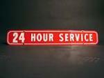 1960s Firestone "24 Hour Service" tin painted garage sign. - Front 3/4 - 50352
