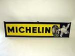 Outstanding 1950s Michelin Tires single-sided horizontal porcelain garage sign with Bibedum graphic. - Front 3/4 - 93815