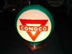 Addendum Item - Circa 1949 Conoco Gasoline green plastic bodied Capco globe with glass lenses. Condition: 9.25-9.5 - Front 3/4 - 99642