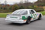 1986 PONTIAC GRAND PRIX - RUSTY WALLACE'S #27 KODIAK NASCAR RACE CAR - Rear 3/4 - 224646