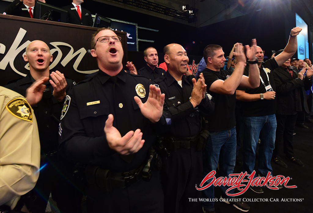 Las Vegas first responders couldn't contain their excitement as the bidding rapidly increased.