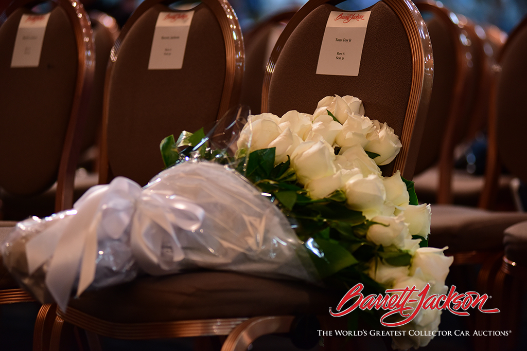 A bouquet of flowers on an empty chair in the front row of the bidder section to honor Thomas Day Jr., one of the 58 victims of the Las Vegas shooting and the son of a longtime Barrett-Jackson customer.