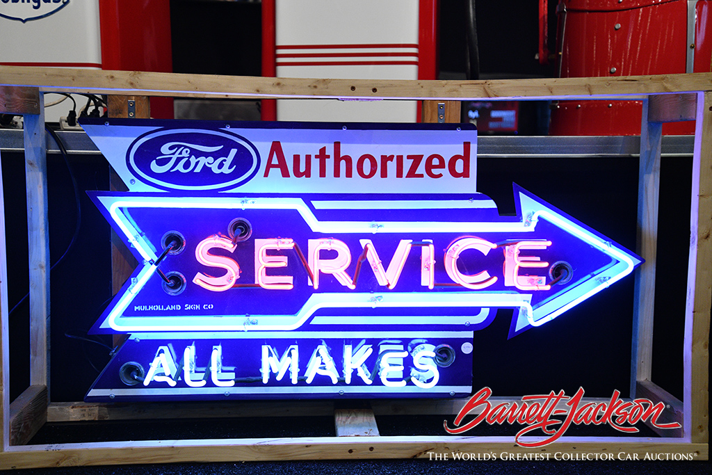 Lot #9396.1 - 1940S FORD AUTHORIZED SERVICE NEON PORCELAIN ARROW SIGN - $28,750