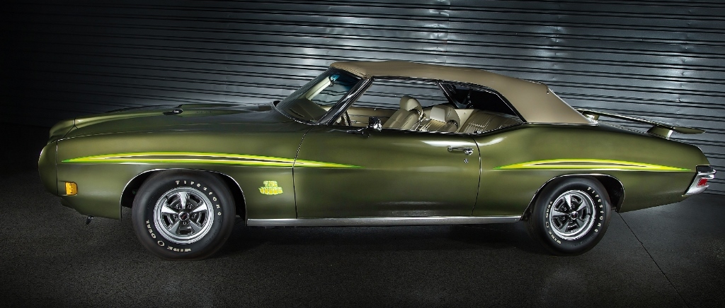 One of a pair of fully restored Pontiac GTO Judge convertibles set to cross the block in Las Vegas, Lot #710 is dressed in Verdoro Green.