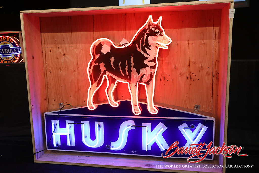 Lot #9493 - 1950S HUSKY OIL PORCELAIN HUSKY DOG MARQUEE SIGN WITH NEON - $40,250