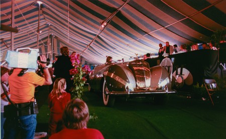 Tom Barrett on the auction block in the 1980s