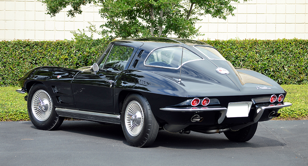 Striking Tuxedo Black example of a split-window Corvette (Lot #1063).