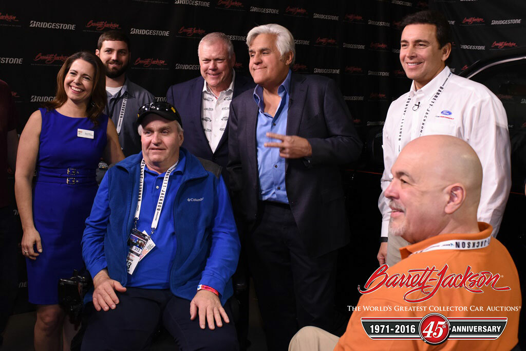 Craig Jackson, Jay Leno and Mark Fields with Elena Sullivan and other representatives of the Multiple Sclerosis Society.