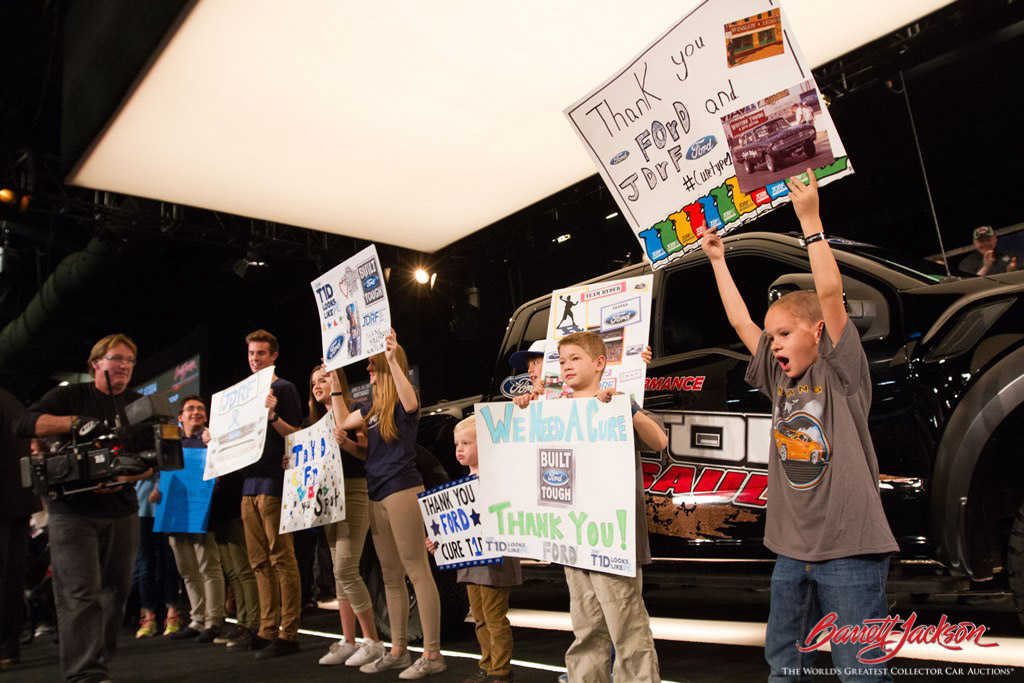 Enthusiastic kids from JDRF helped raise $157,000 (plus another $50,000 donation) for the organization through the sale of a 2017 Ford Raptor Pickup (Lot #3004).