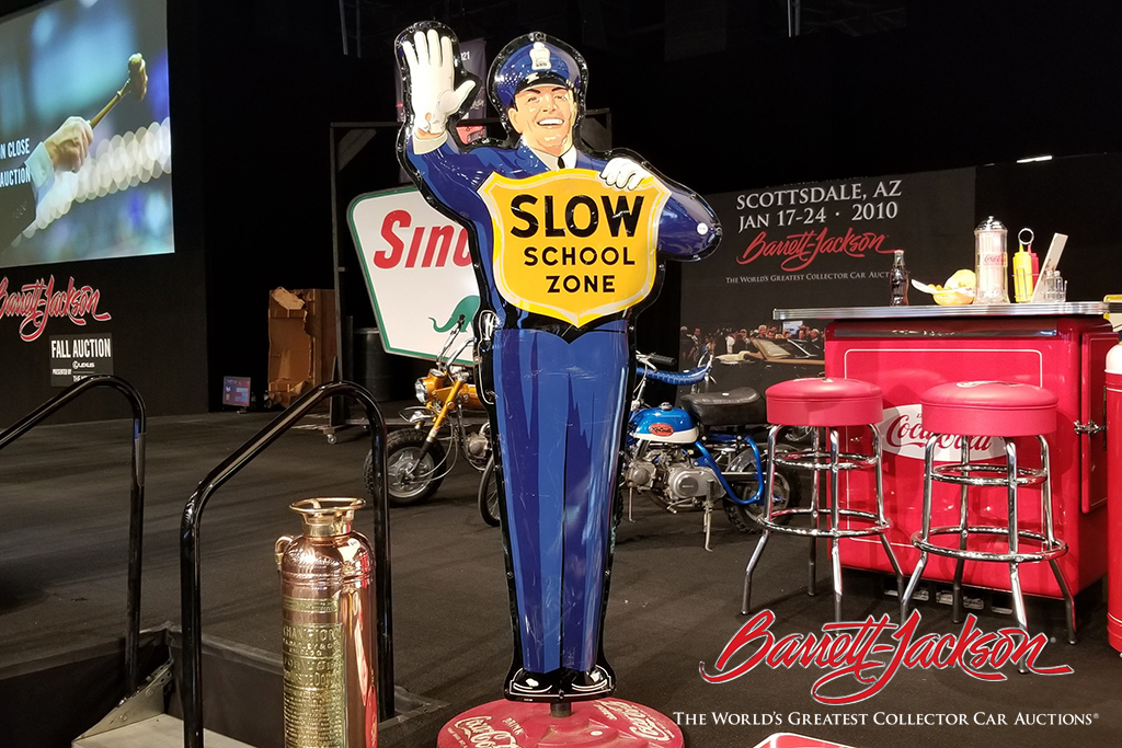 LOT #8185 - 1950S COCA-COLA "SCHOOL ZONE" POLICEMAN TIN SIGN - $11,500