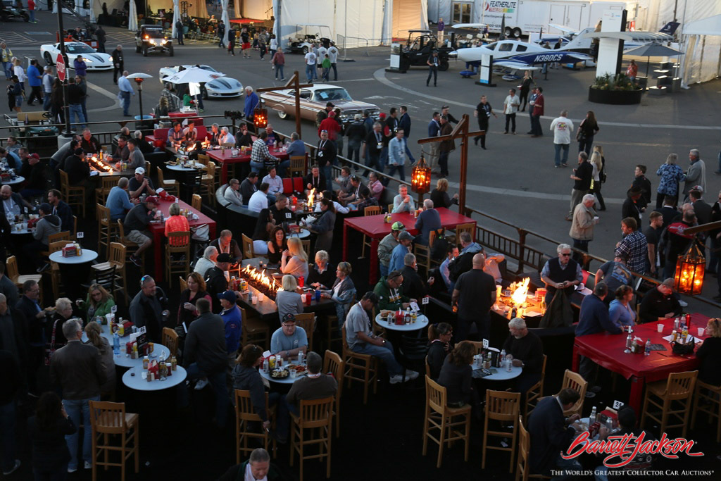 Guests taking a break from the action right next to the staging lanes at the Coca-Cola Garage & Patio.