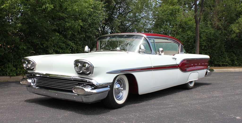 This striking 1958 Pontiac Star Chief custom hardtop (Lot #758) combines 1950s style with the best of modern technology.