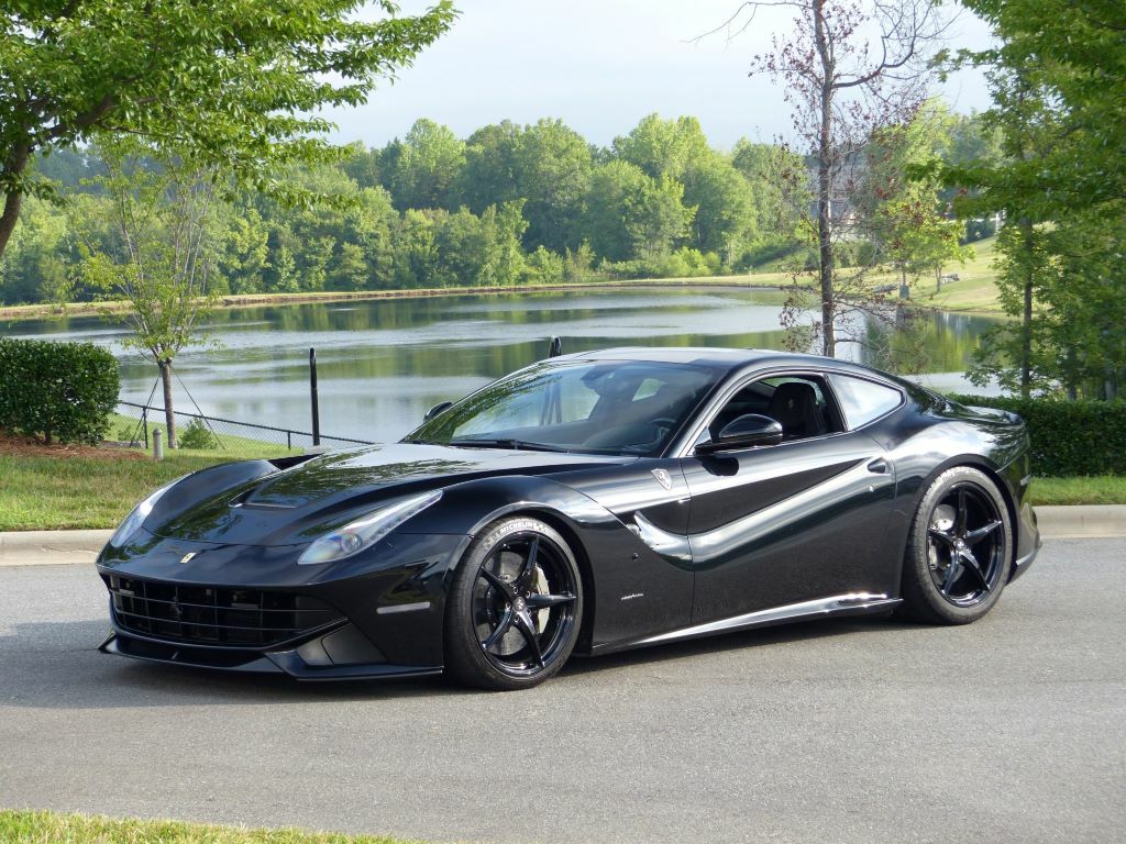 A Ferrari F12 Berlinetta is powered by a 729hp 6.3-liter V12 engine mated to a 7-speed F1 dual-clutch automatic transmission. Goes from 0 to 60 mph in 3.6 seconds.