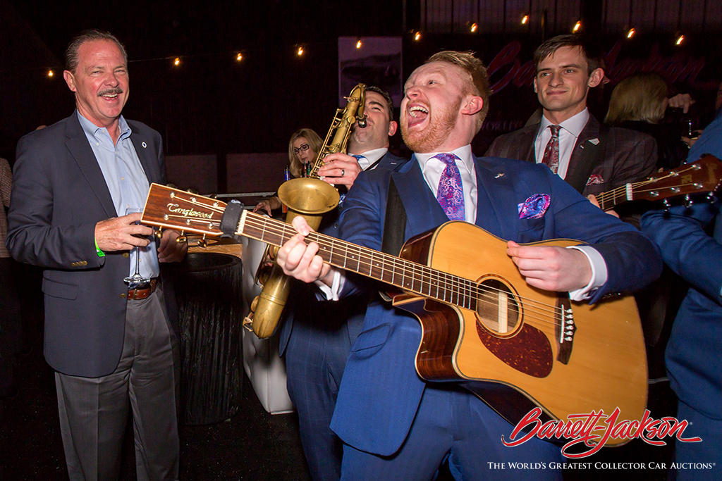 Scottsdale Mayor Jim Lane (left) enjoying the antics of The London Essentials during the Opening Night Gala.