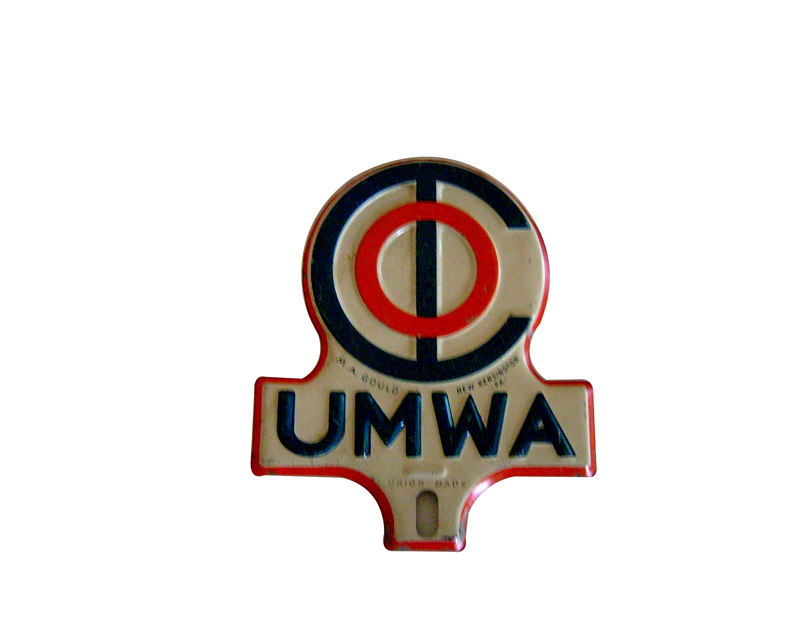 1940s United Mine Workers of America license plate attachment sign from New Kensington, PA. - Front 3/4 - 125654