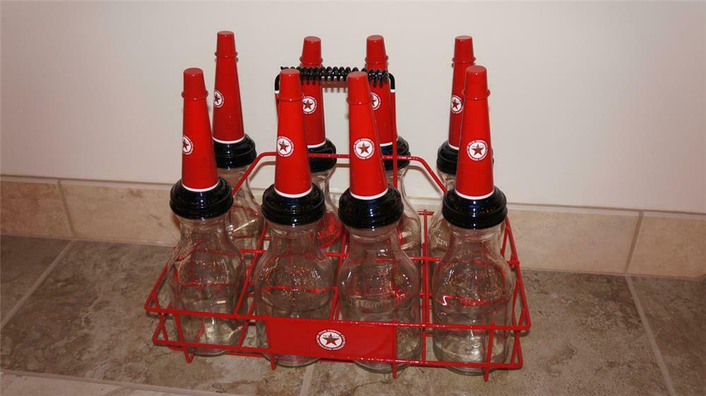 Restored 1930's Texaco filling station rack of eight glass oi