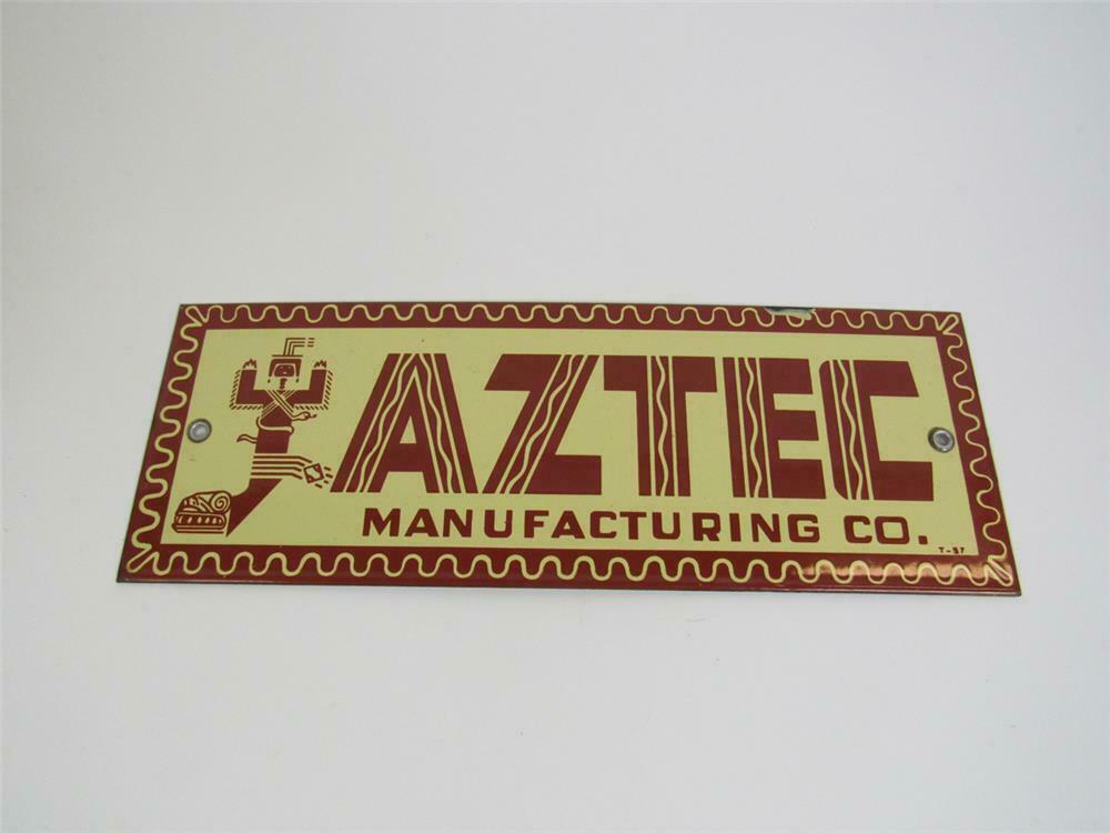 1957 Aztec Manufacturing Company singlesided porcelain sign.