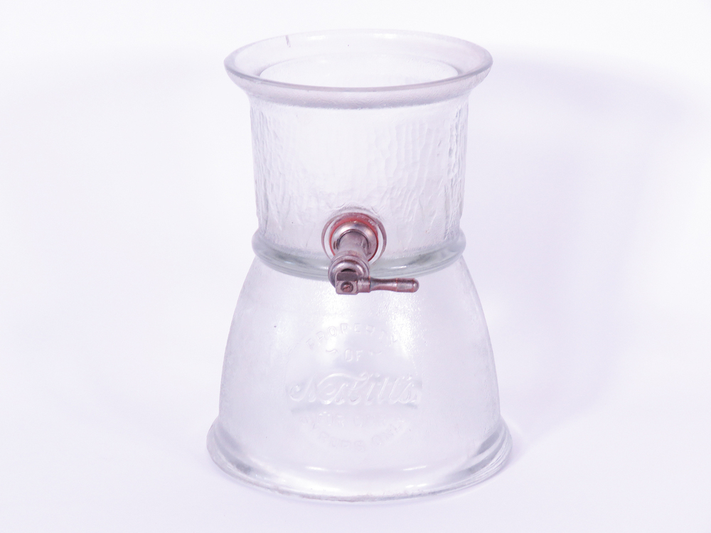 CIRCA 1930S NESBITT'S ORANGE SODA GLASS SYRUP DISPENSER