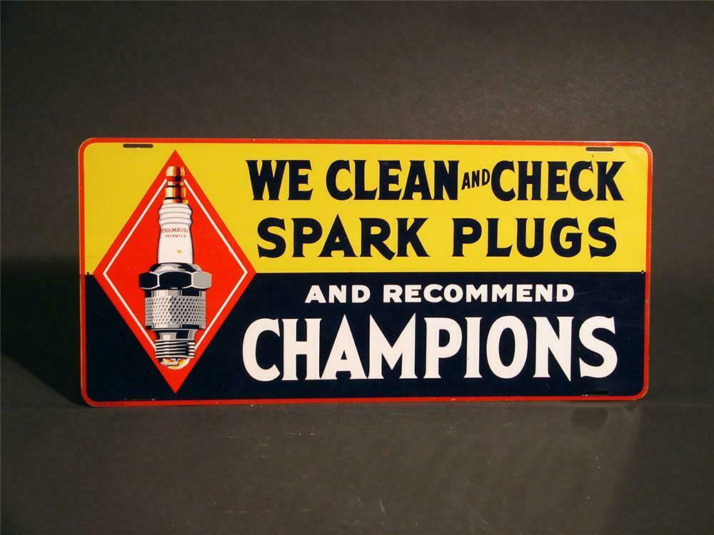 N.O.S. Champion Spark station sign with -