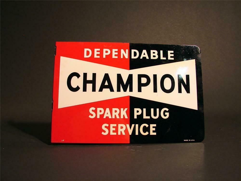N.O.S. 1950s Champion Spark Plugs tin painted flange sign.