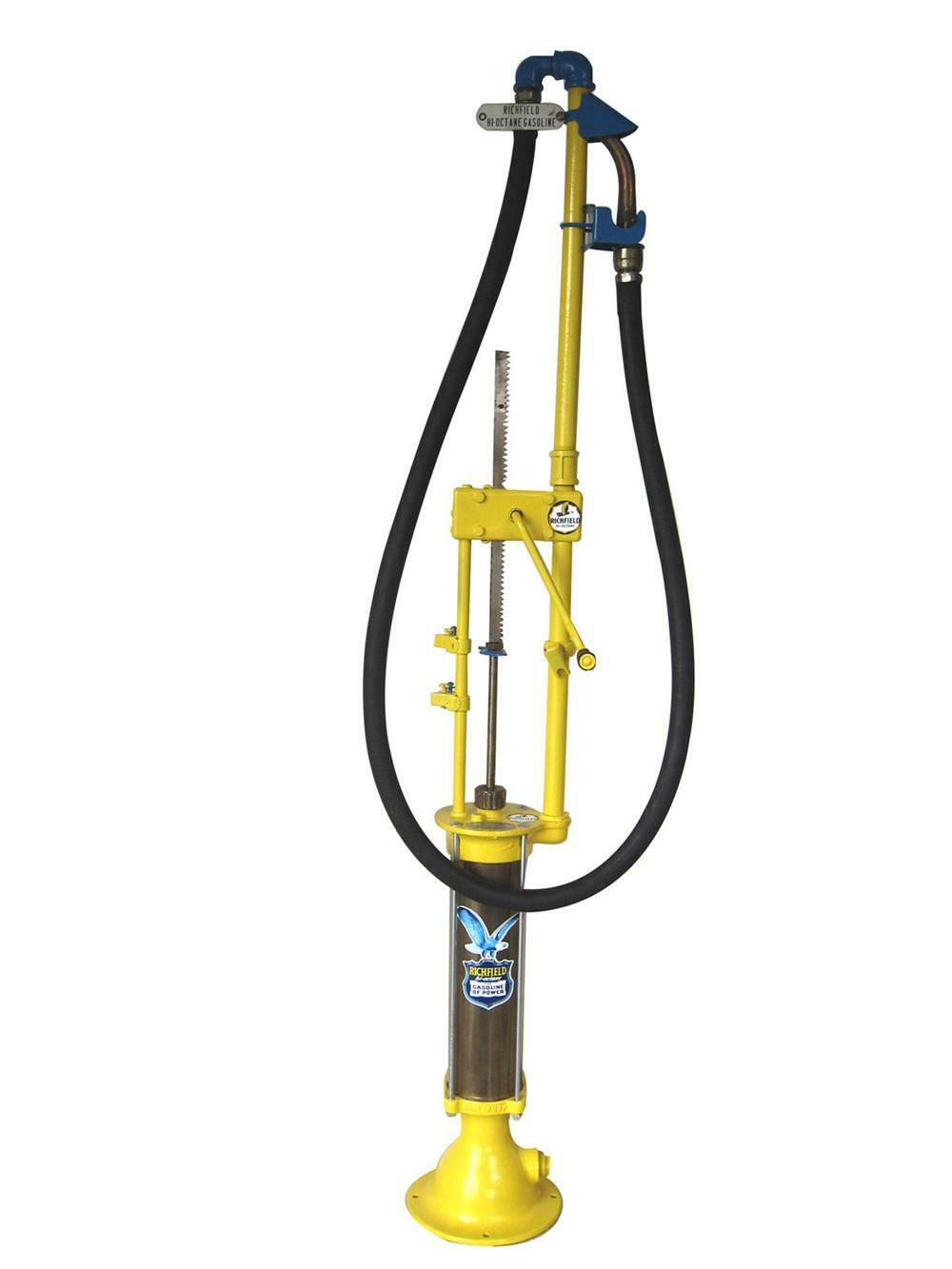 Very early brass era of motoring manual gas pump done up in Richfield