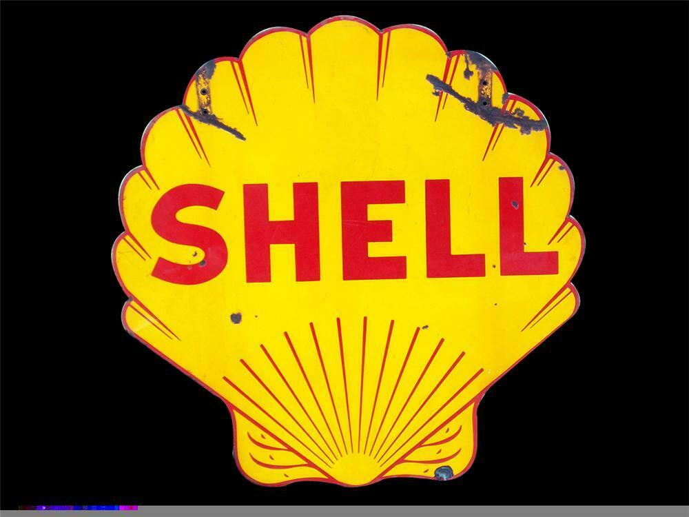 1930s Shell Oil double-sided clam shell shaped service statio