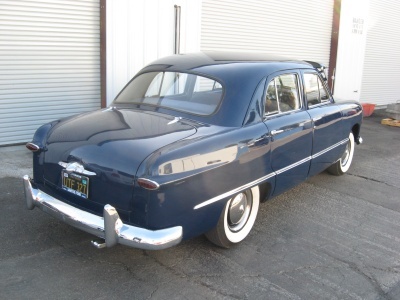 1949 FORD DELUXE 4 DOOR HARDTOP - Rear 3/4 - 81244