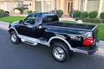 1997 FORD F-150 LARIAT 4X4 SPORTSIDE PICKUP - Rear 3/4 - 224341