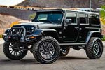 2016 JEEP WRANGLER UNLIMITED CUSTOM SUV - Front 3/4 - 227961