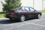 2002 OLDSMOBILE INTRIGUE GL SEDAN "THE FINAL 500" - Rear 3/4 - 66354