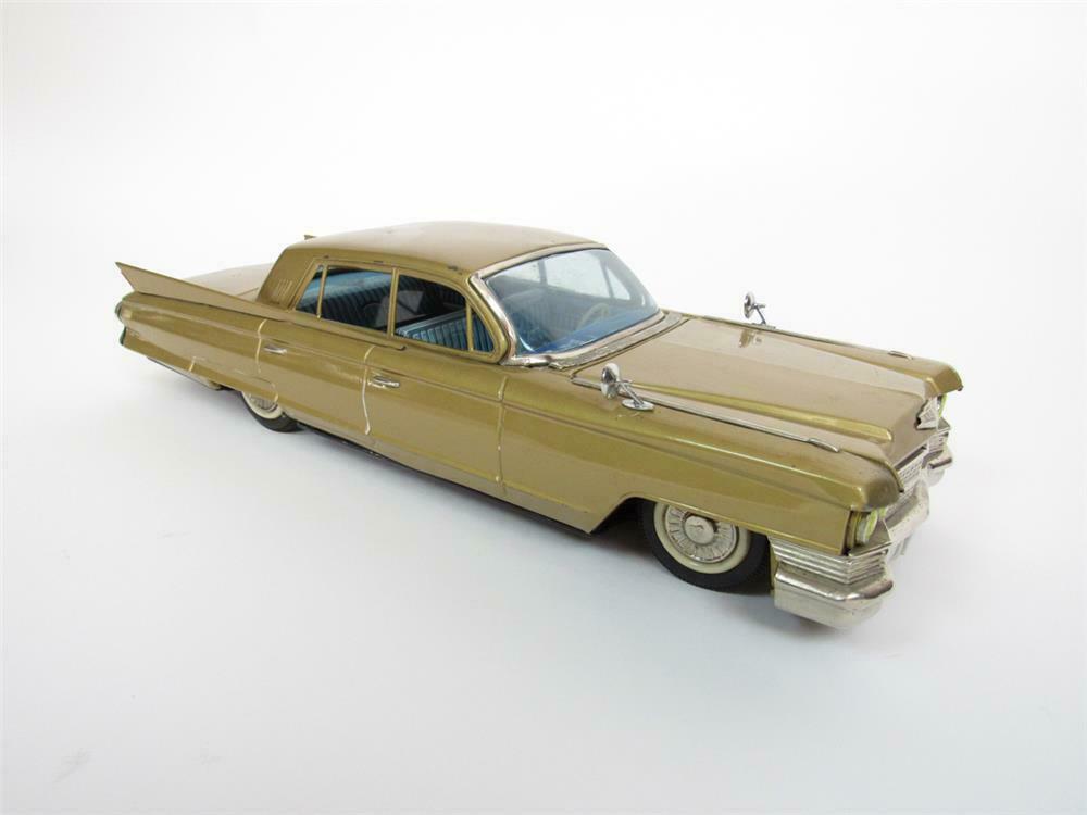 Large 1960 Cadillac 4-door sedan tin litho toy car. - Automobilia